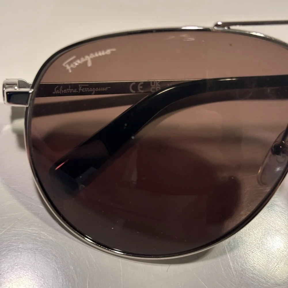 Ferragamo men sunglasses worn twice